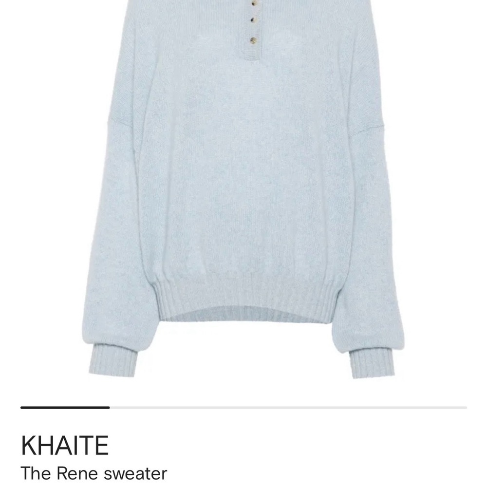 KHAITE Light Blue Sweater and Dark Blue Jeans